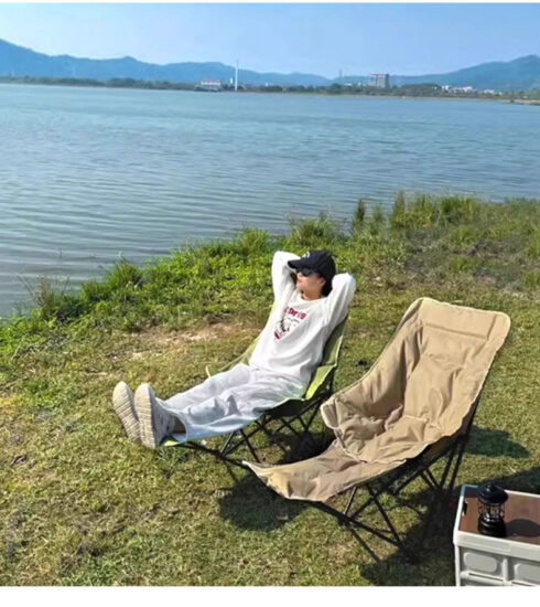 Portable outdoor reclining chair with foldable design and armrests