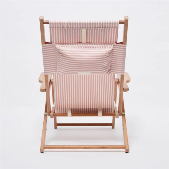 Custom wooden beach lounge chair with pillow and patterned oxford cloth